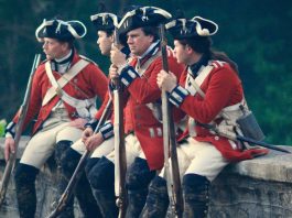 American revolutionary soldiers sitting and chatting